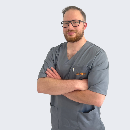 lekarz stomatolog spec. chirurgii twarzowo-szczękowej, implanty Piotr Momot 